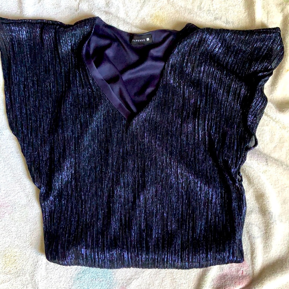 It is a party shirt the color is navy blue